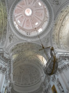 The interior of the basilica with the boat-shaped chandelier